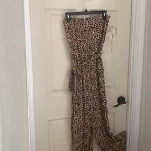 Cheats print strapless romper full length size medium.